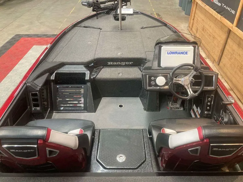 Slide: The Image of 2022 Ranger Z520R boat interior with Lowrance navigation system and dual seats. - 6