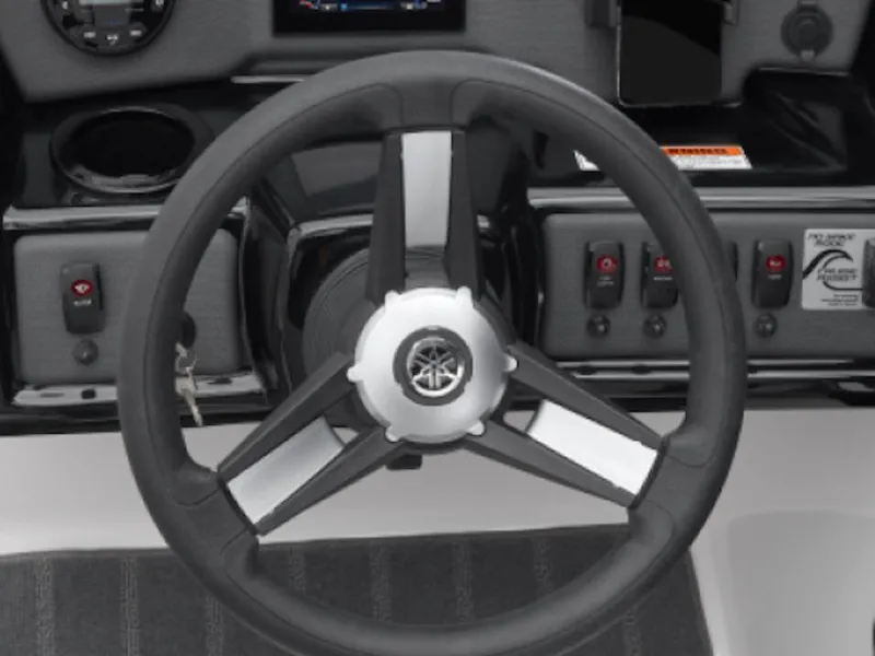 Slide: The Image of Steering wheel of 2025 Yamaha Boats AR190, featuring control panel and switches. - 6