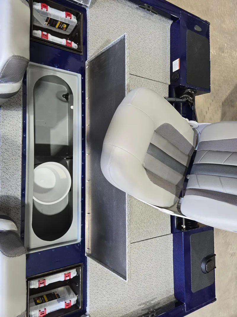 Slide: The Image of 2025 G3 Sportsman 1710 boat interior with seating and storage compartments. - 12