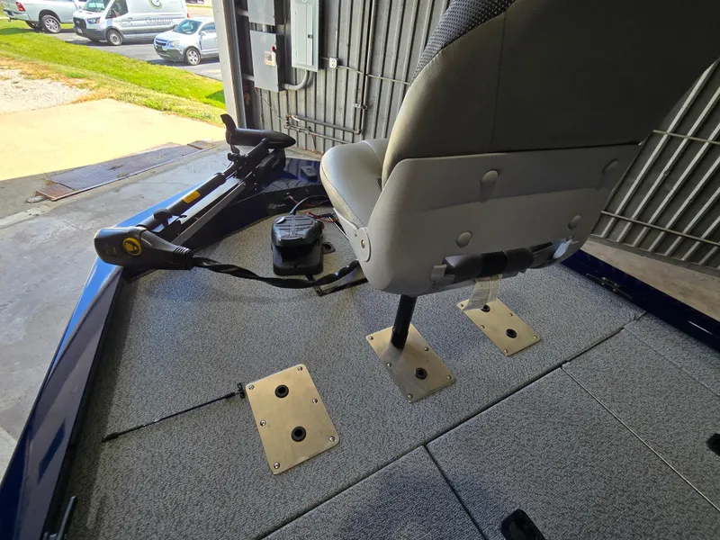 Slide: The Image of 2025 G3 Sportsman 1710 boat interior with mounted seat and trolling motor. - 6