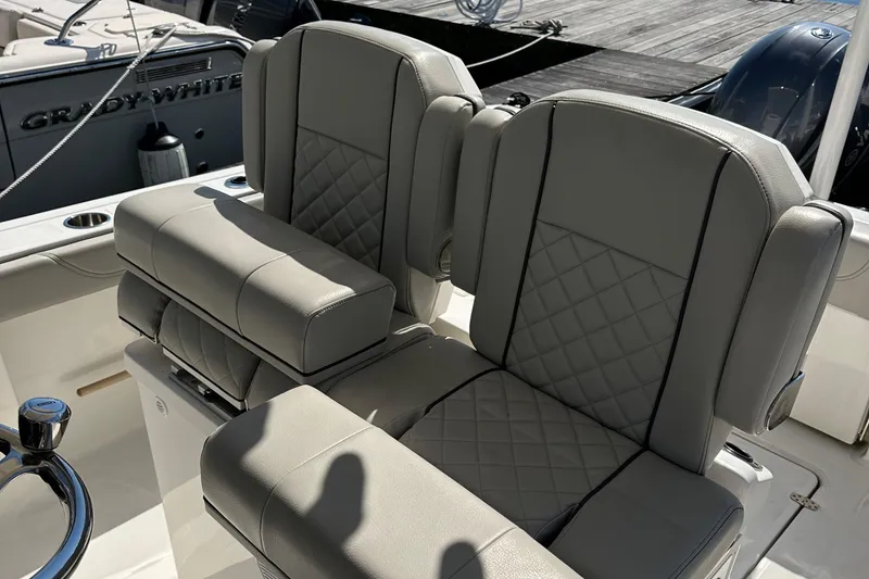 Slide: The Image of 2024 Pursuit S 268 Sport boat seats with quilted design and armrests. - 20
