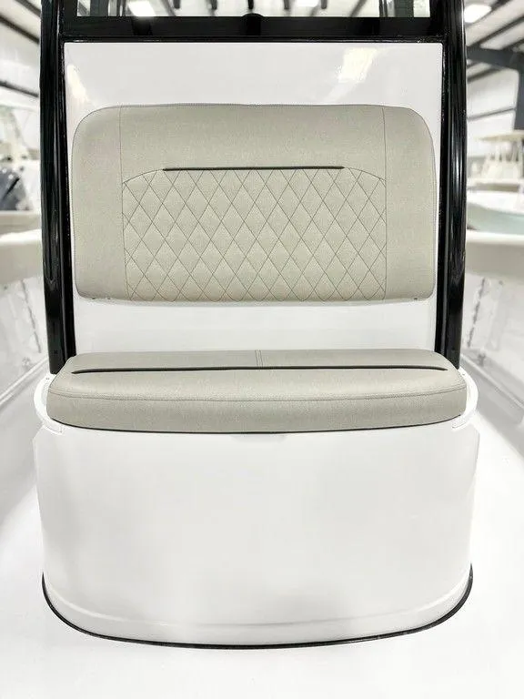Slide: The Image of 2025 Sportsman Open 232 boat seat with diamond-patterned upholstery. - 5