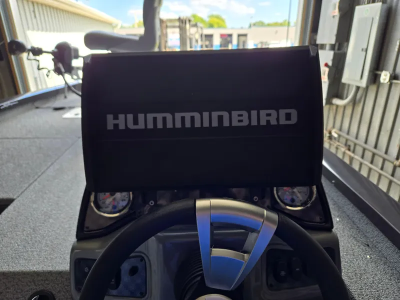 Slide: The Image of 2025 G3 Sportsman 1810 PFX boat dashboard with Humminbird display. - 11