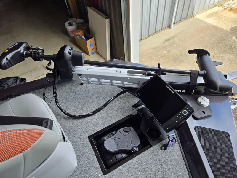 Slide: The Image of 2025 G3 Sportsman 1810 PFX boat interior with trolling motor and control panel. - 7