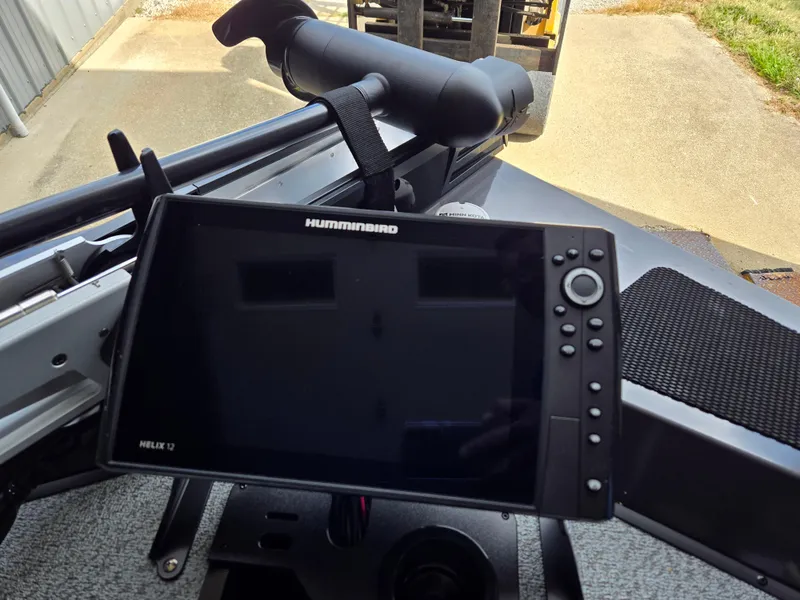 Slide: The Image of Humminbird Helix 12 fish finder on 2025 G3 Sportsman 1810 PFX boat dashboard. - 8