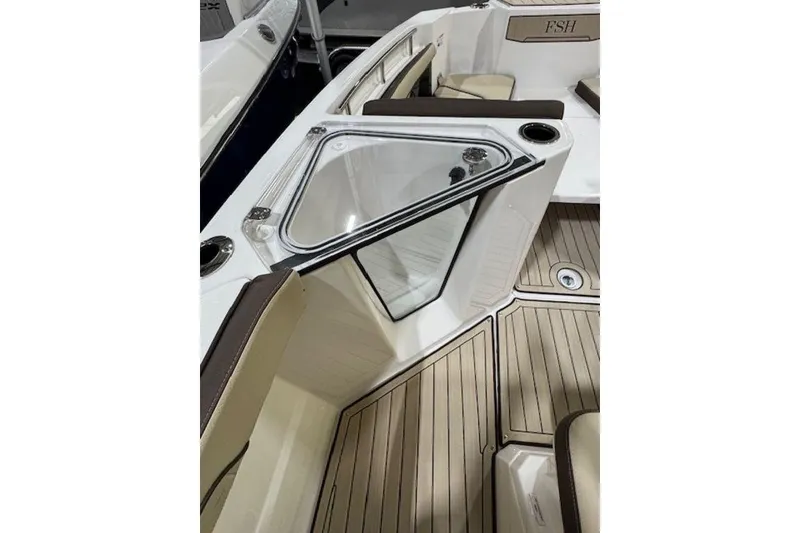 Slide: The Image of 2025 Yamaha Boats 252 FSH Sport interior with sleek seating and modern design. - 11