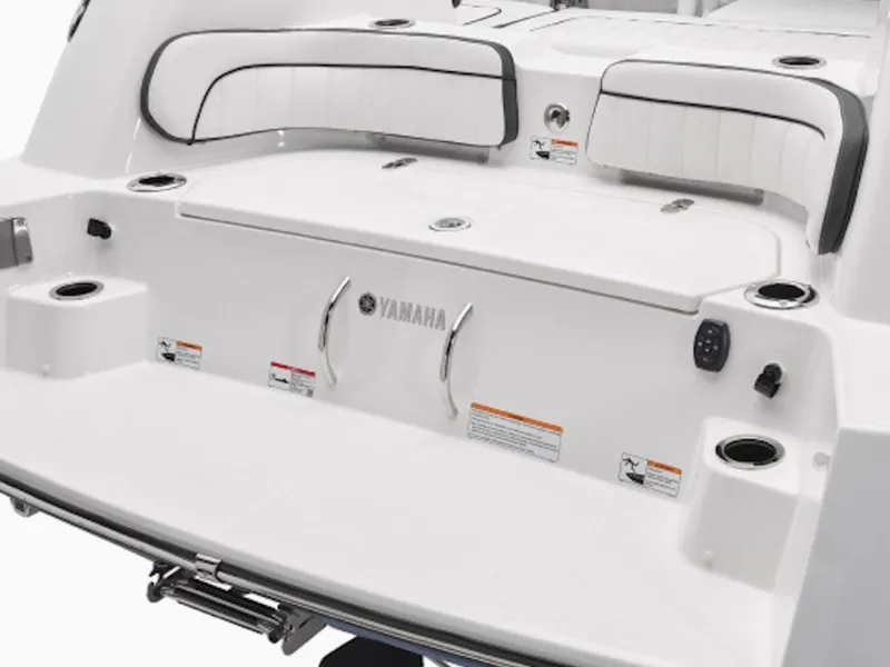 Slide: The Image of 2025 Yamaha Boats 252 FSH Sport dashboard with steering wheel and electronic controls. - 3