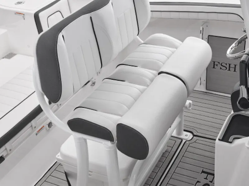 Slide: The Image of 2025 Yamaha Boats 252 FSH Sport interior seating area with beige cushions. - 4
