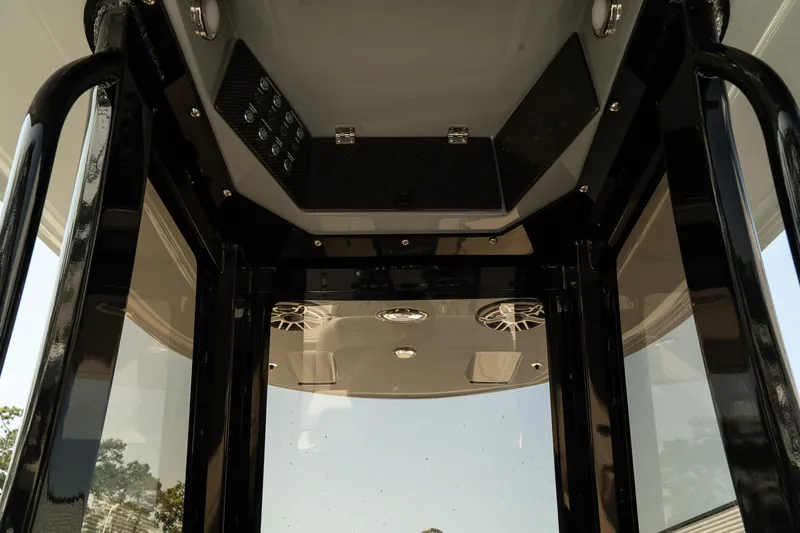 Slide: The Image of Interior view of 2025 ShearWater 27 Carolina Open boat's helm station. - 20