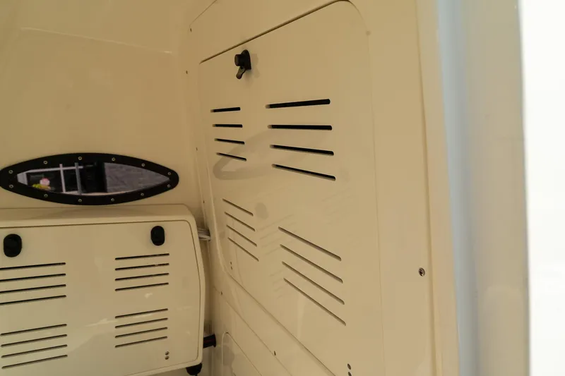 Slide: The Image of Interior view of 2025 ShearWater 27 Carolina Open boat cabin. - 39