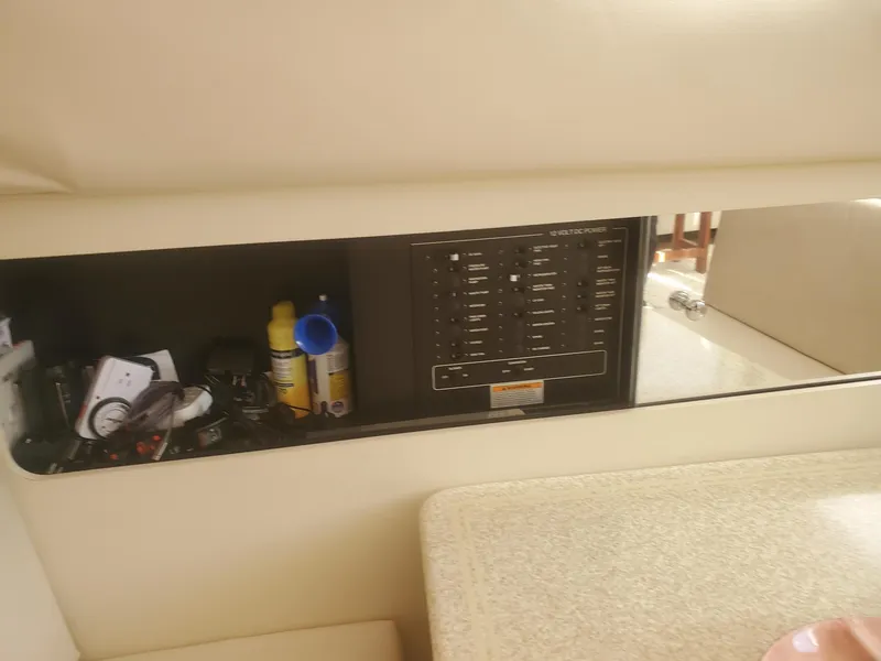 Slide: The Image of Control panel and storage in 2000 Carver 356 Aft Cabin Motor Yacht interior. - 23