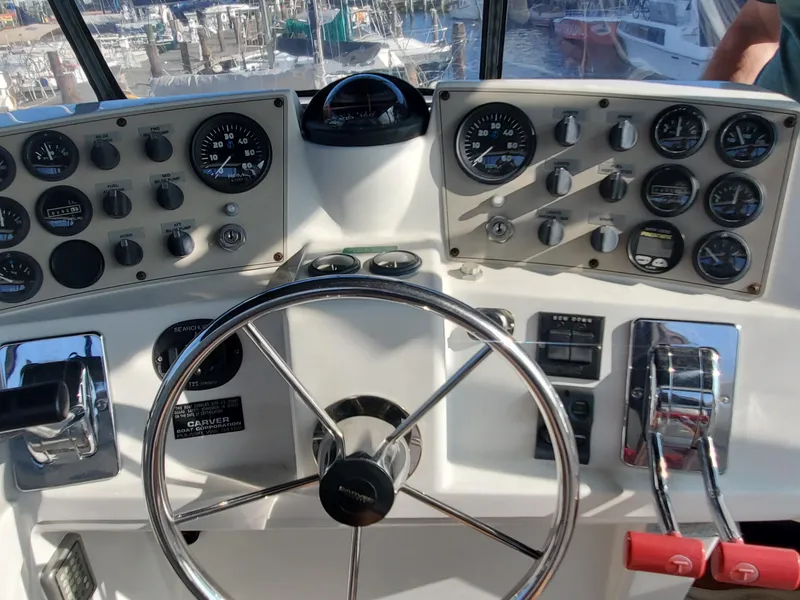 Slide: The Image of Helm of 2000 Carver 356 Aft Cabin Motor Yacht with gauges and controls. - 3