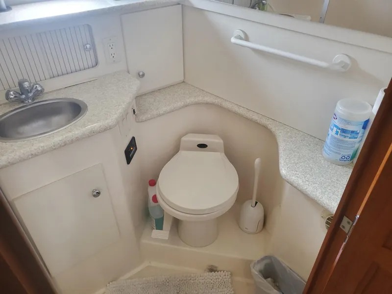 Slide: The Image of Bathroom in 2000 Carver 356 Aft Cabin Motor Yacht with sink and toilet. - 40