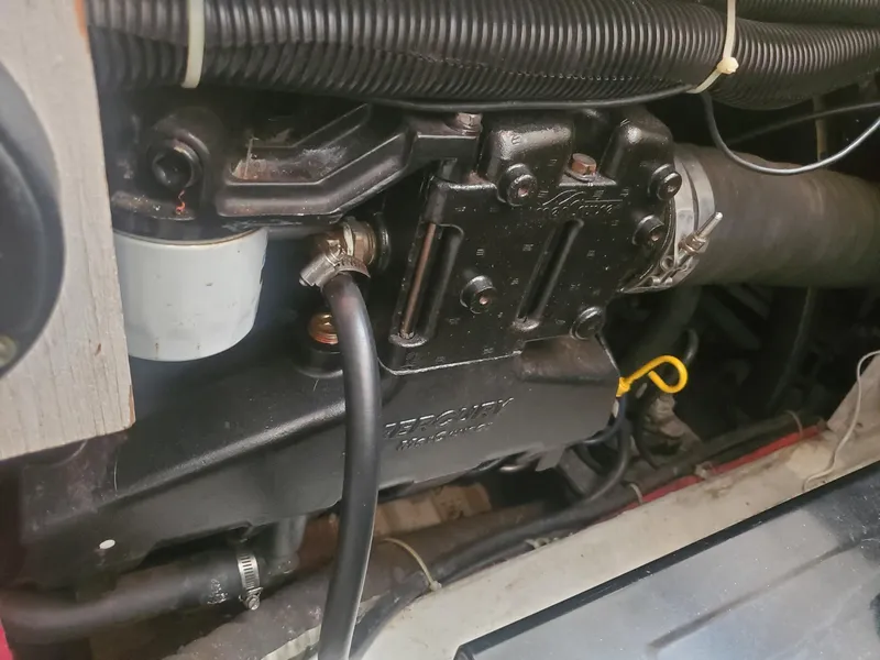 Slide: The Image of Engine compartment of a 2000 Carver 356 Aft Cabin Motor Yacht, showing mechanical components. - 42