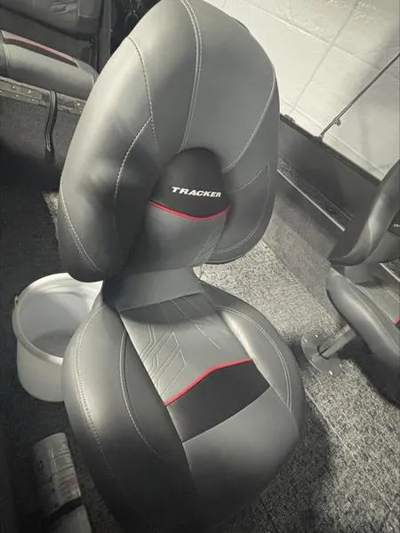 Slide: The Image of 2025 Tracker PG V175 CB boat seat with sleek gray and red design. - 6