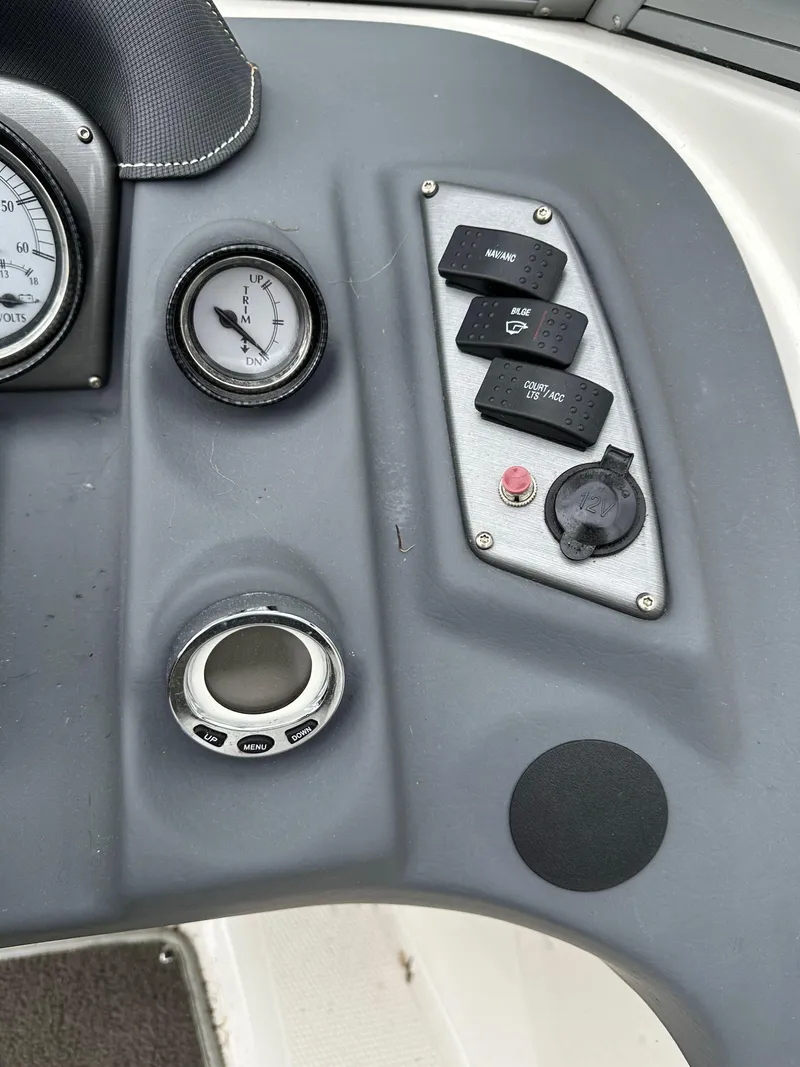 Slide: The Image of Dashboard of 2012 Chaparral 220 SSi boat with gauges and controls. - 10