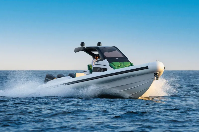 Slide: The Image of 2025 Panamera Yacht PY 110 Veloce speeding on open water. - 1