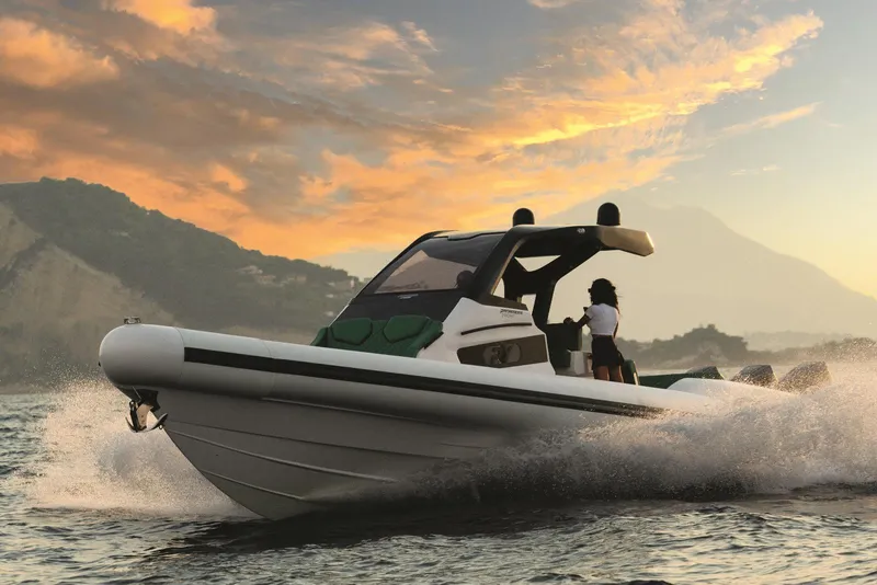 Slide: The Image of 2025 Panamera Yacht PY 110 Veloce cruising at sunset on open water. - 2