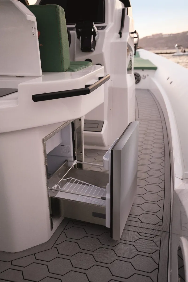 Slide: The Image of 2025 Panamera Yacht PY 110 Veloce with open onboard refrigerator, sleek deck design. - 7