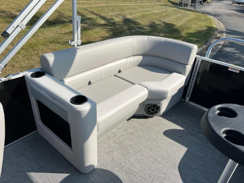 Slide: The Image of 2025 Godfrey Xperience 2286 SBX pontoon boat seating area with cup holders. - 13