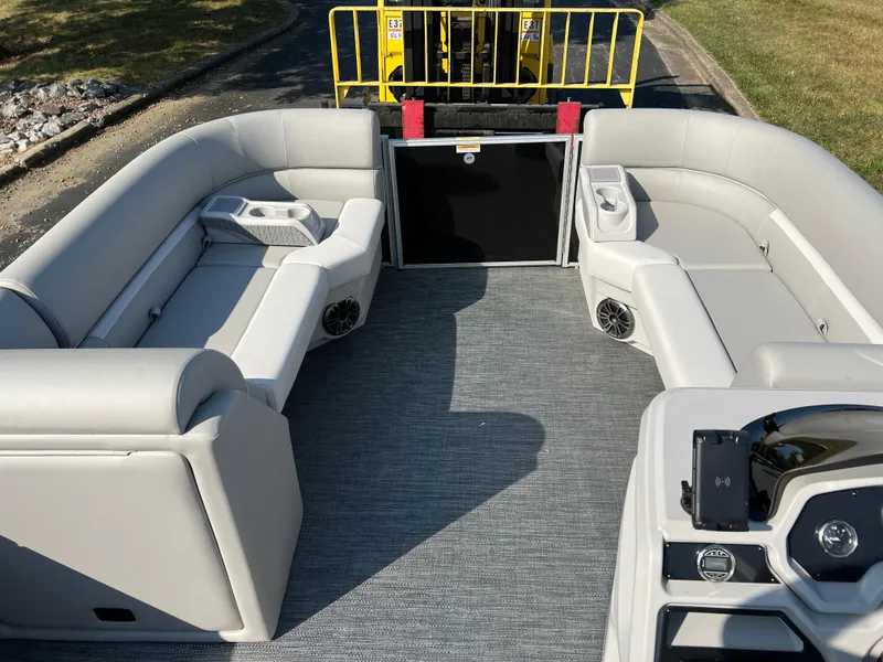Slide: The Image of 2025 Godfrey Xperience 2286 SBX pontoon boat interior with gray seating and modern design. - 21