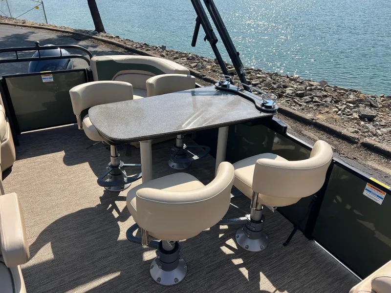 Slide: The Image of Pontoon boat interior with table and chairs, Godfrey SWEETWATER 2286 MT, 2025 model. - 12