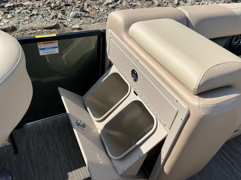 Slide: The Image of Interior of 2025 Godfrey SWEETWATER 2286 MT boat with storage compartments open. - 24