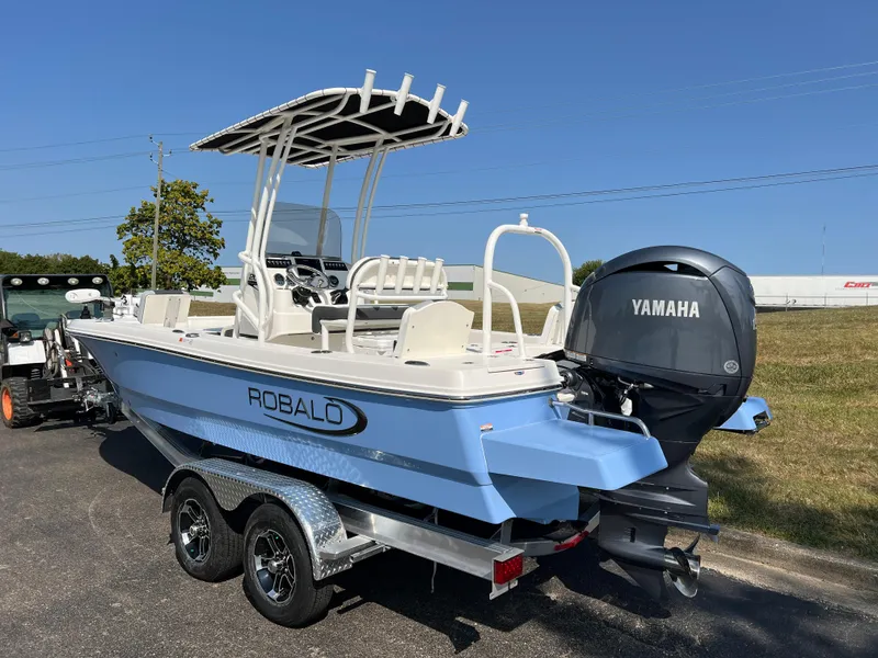 Slide: The Image of 2025 Robalo 206 Cayman boat with Yamaha engine on trailer. - 7