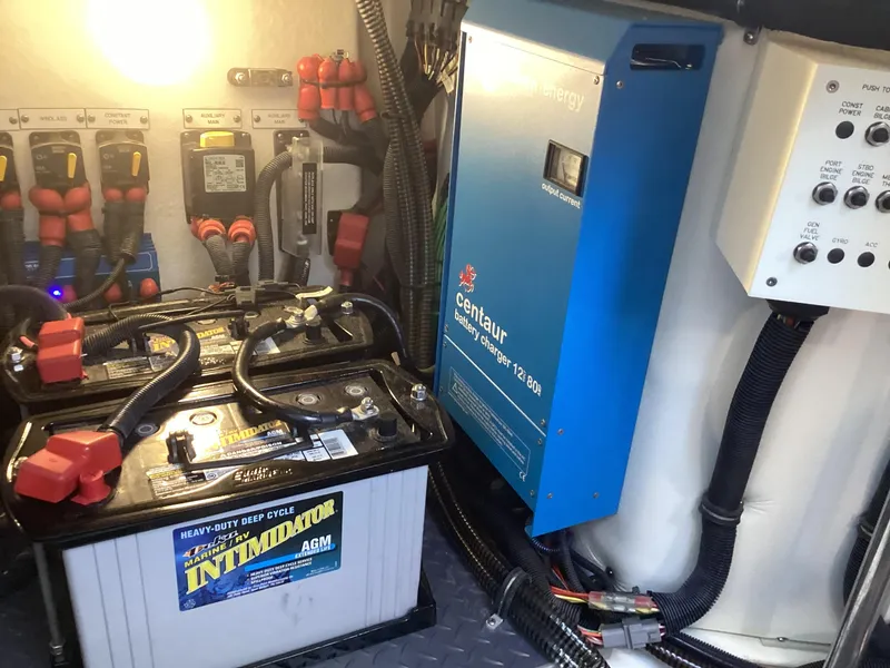 Slide: The Image of Electrical system of a 2020 Formula 380 Super Sport Crossover with batteries and charger. - 13