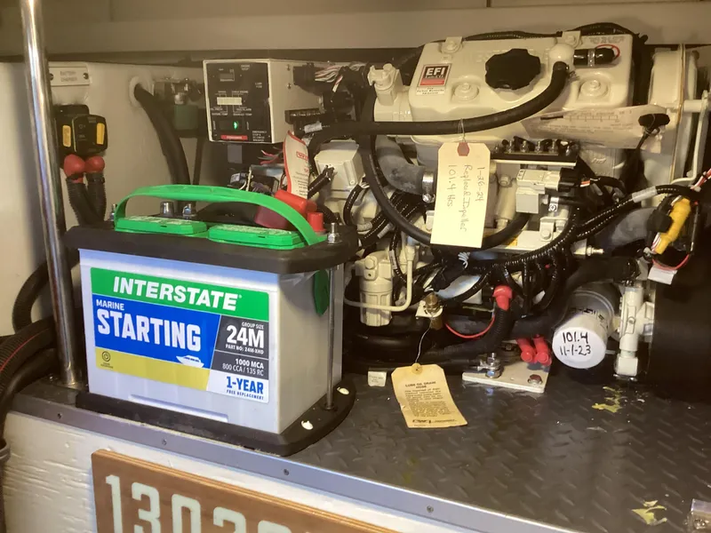 Slide: The Image of Engine compartment of a 2020 Formula 380 Super Sport Crossover with marine battery. - 17