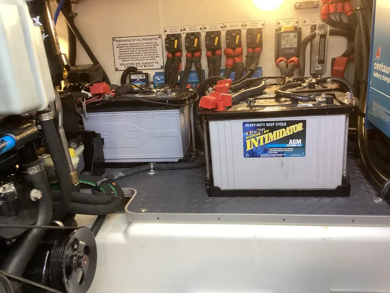 Slide: The Image of Engine room of 2020 Formula 380 Super Sport Crossover with batteries and wiring. - 22