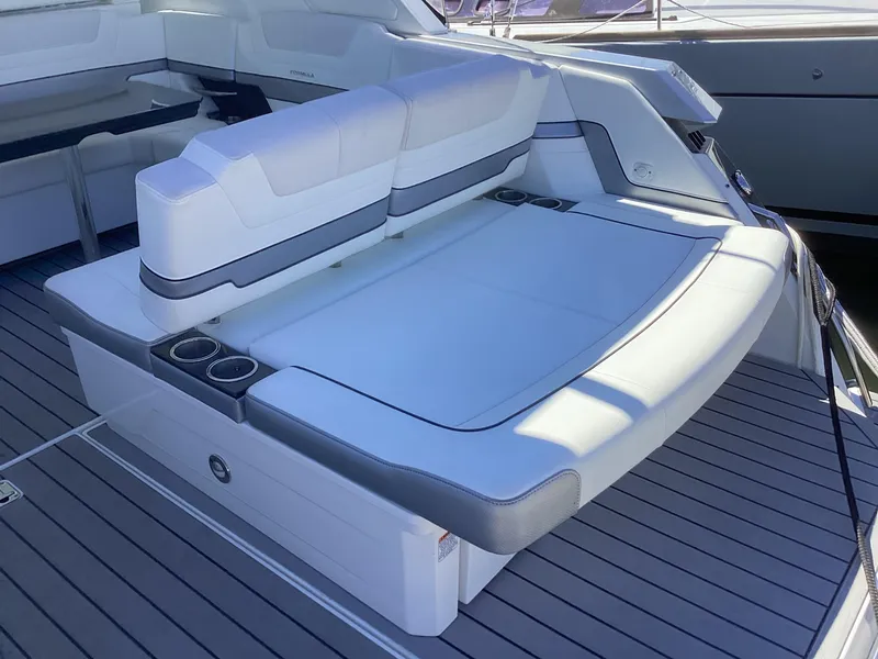 Slide: The Image of 2020 Formula 380 Super Sport Crossover boat with spacious seating and sleek design. - 30