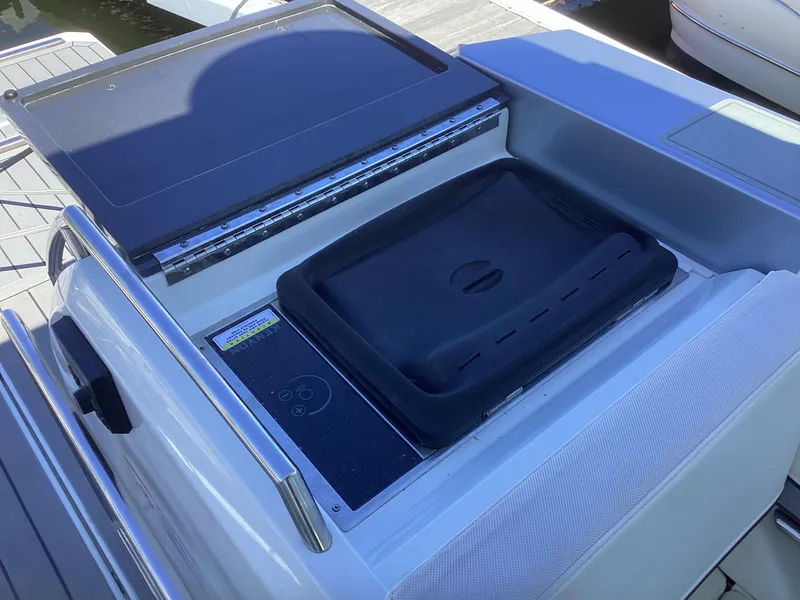 Slide: The Image of 2020 Formula 380 Super Sport Crossover boat grill and prep station on deck. - 39