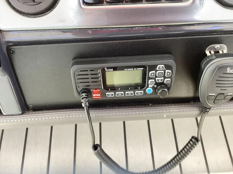 Slide: The Image of Control panel of a 2020 Formula 380 Super Sport Crossover with Icom marine radio. - 8