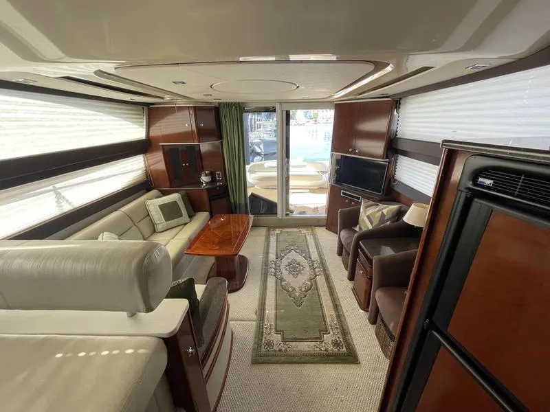 Slide: The Image of Luxurious interior of a 2012 Meridian 441 Sedan yacht with elegant seating and decor. - 17