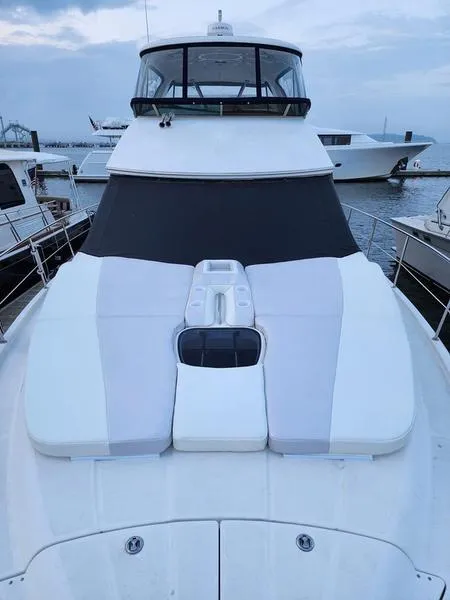 Slide: The Image of 2012 Meridian 441 Sedan yacht docked at marina, front view. - 39