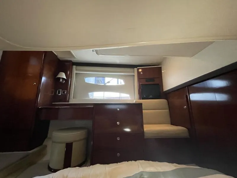 Slide: The Image of Luxurious interior of 2012 Meridian 441 Sedan yacht with wood cabinetry and seating. - 41