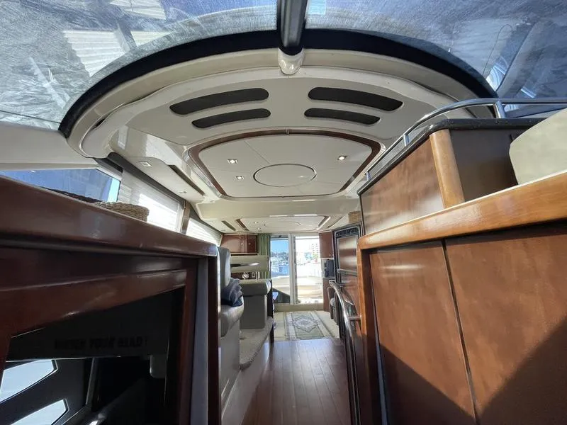 Slide: The Image of Interior of 2012 Meridian 441 Sedan yacht with elegant wood finishes and modern design. - 47