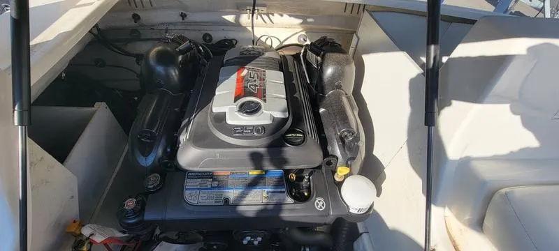 Slide: The Image of Engine compartment of 2017 Sea Ray 220 SD boat, showcasing powerful engine components. - 15