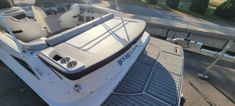 Slide: The Image of 2017 Sea Ray 220 SD boat with spacious seating and sleek design. - 19