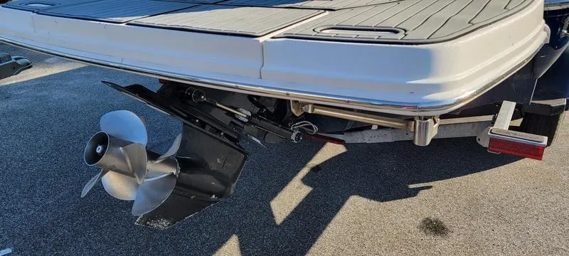 Slide: The Image of 2017 Sea Ray 220 SD boat stern with propeller and swim platform. - 2