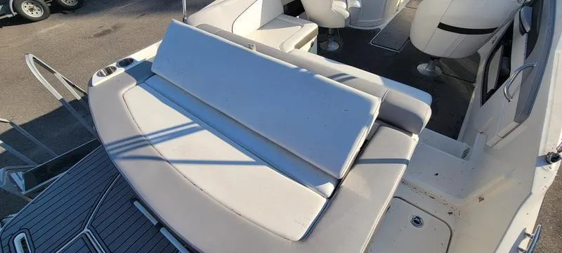 Slide: The Image of 2017 Sea Ray 220 SD boat with spacious seating and sleek design. - 22