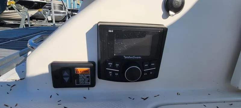 Slide: The Image of Control panel of a 2017 Sea Ray 220 SD boat with audio system. - 28