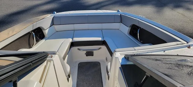 Slide: The Image of 2017 Sea Ray 220 SD boat interior with spacious seating and modern design. - 4