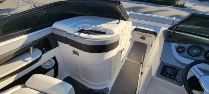 Slide: The Image of 2017 Sea Ray 220 SD boat interior with seating and dashboard. - 6