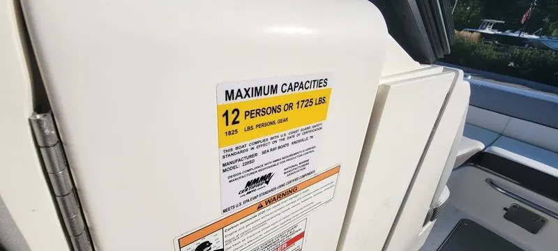 Slide: The Image of Sea Ray 220 SD 2017 boat capacity label, maximum 12 persons or 1725 lbs. - 7