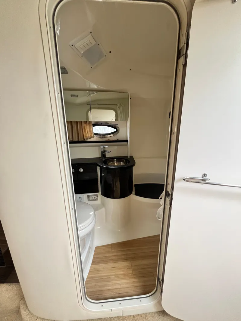 Slide: The Image of Interior of 2013 Formula 400 SS FX8 boat bathroom with mirror and sink. - 13