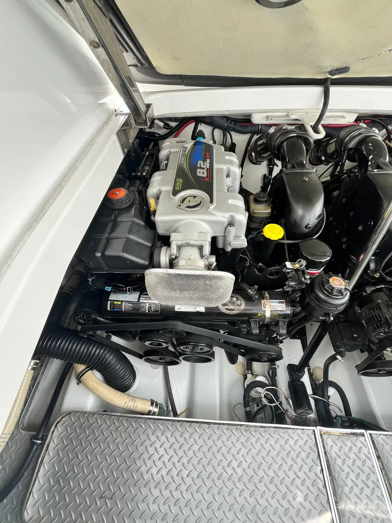 Slide: The Image of Engine compartment of a 2013 Formula 400 SS FX8 boat, showcasing detailed components. - 18