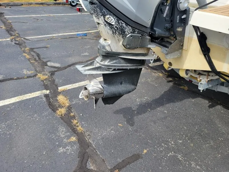 Slide: The Image of Damaged propeller of a 2018 Zodiac NZO 22 boat in a parking lot. - 15