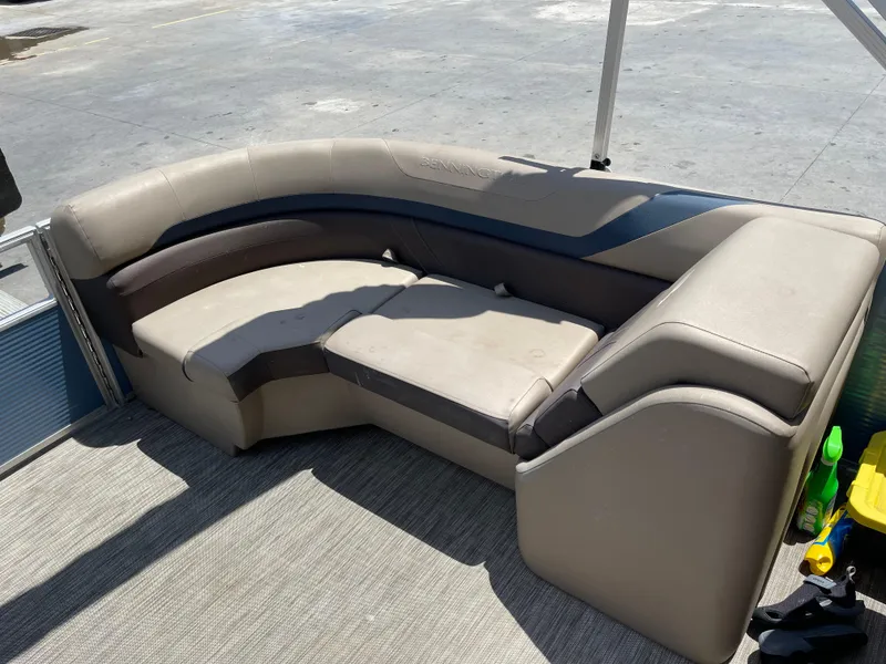 Slide: The Image of 2020 Bennington SX 23 SXSR pontoon boat interior with beige seating. - 34